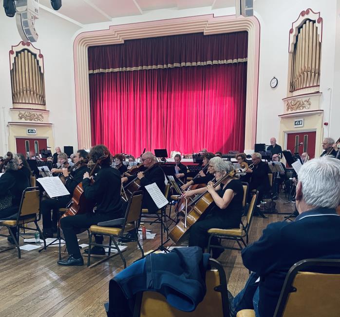Chris, middle at the back,  in this well-known orchestra